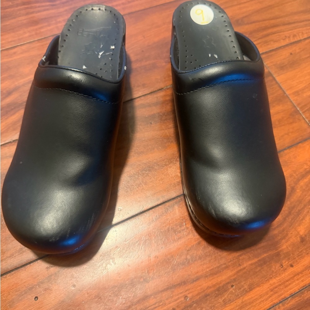 Dansko Black Leather Slip-On Clogs